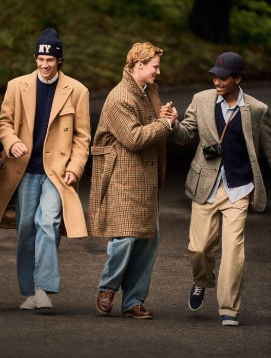 Man wears a brown sport coat over a Fair Isle sweater.